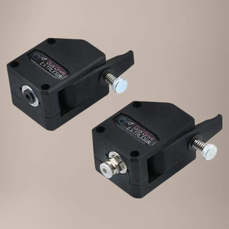 A pair of black rotary switches on a beige background.