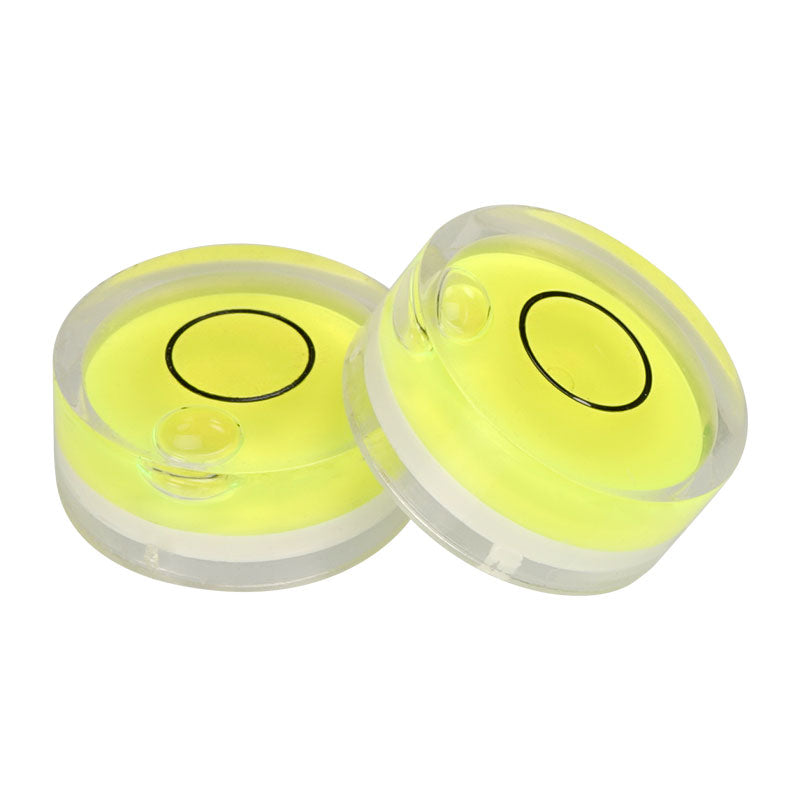 The Mini Spirit Level for Platform Calibration and Precision Leveling by 3D Printing Perth - Cirrus Link features two circular vials filled with yellow liquid and black target markings, providing precise leveling essential for 3D printer calibration to improve print quality.