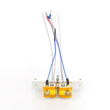 The Extruder Assembly for the Flashforge Dreamer 3D Printer, by Flashforge, includes dual heating blocks with wiring and temperature sensors mounted on a sturdy metal bracket for precise 3D printing.
