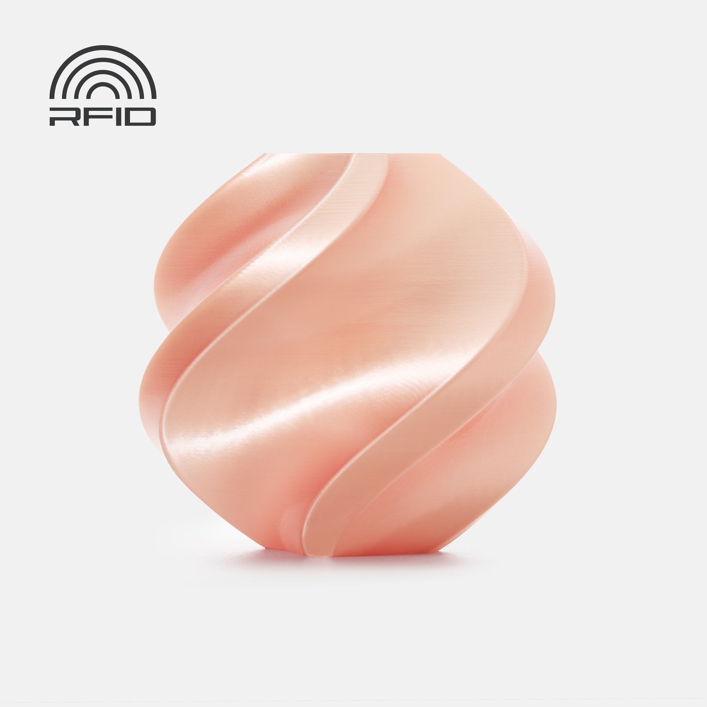 A smooth, peach-colored, spiral-shaped object made from BambuLab PLA Silk+ by 3D Printing Perth - Cirrus Link sits on a white background, with the RFID logo in the top left corner.