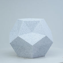 A dodecahedron printed with Flashforge PLA 1.75mm 3D Printing Filament in Marble Colour sits on a white round surface against a light background.