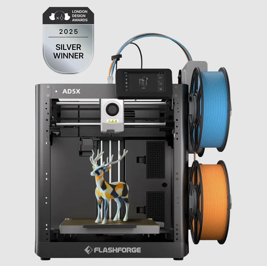 A Flashforge AD5X 3D printer by 3D Printing Perth - Cirrus Link, with two filament spools, demonstrates Smart Multi-Color Printing on a vibrant deer model; a 2025 London Design Awards Silver Winner badge appears above.
