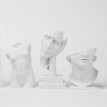 Three sculptures 3D printed with Flashforge HS PLA 1.75mm Filament in Marble Colour stand against a plain white background, each featuring a smooth surface finish that highlights the quality of Flashforge’s material.