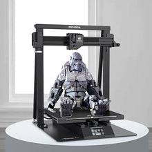 A MINGDA Magician MAX 3D printer set up in a home office, ready for use by an enthusiastic creator.