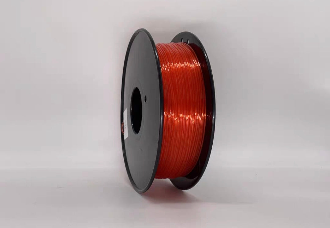 A spool of Toyar TPU Transparent 1.75mm 3D Printing Filament is displayed against a plain white background.