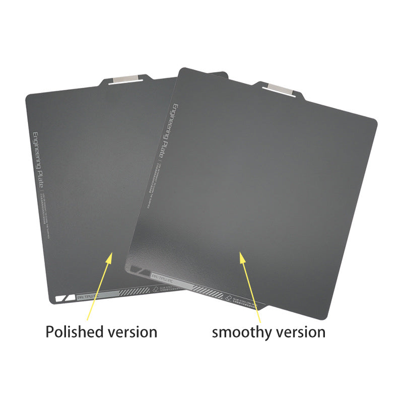 Two gray engineering plates, the "Polished version" and "Smoothy version," are displayed side by side on a Bambu Lab A1 Mini 180x180mm Double Sided Coated PEI Print Surface by 3D Printing Perth - Cirrus Link, showcasing their sleek, smooth surface.