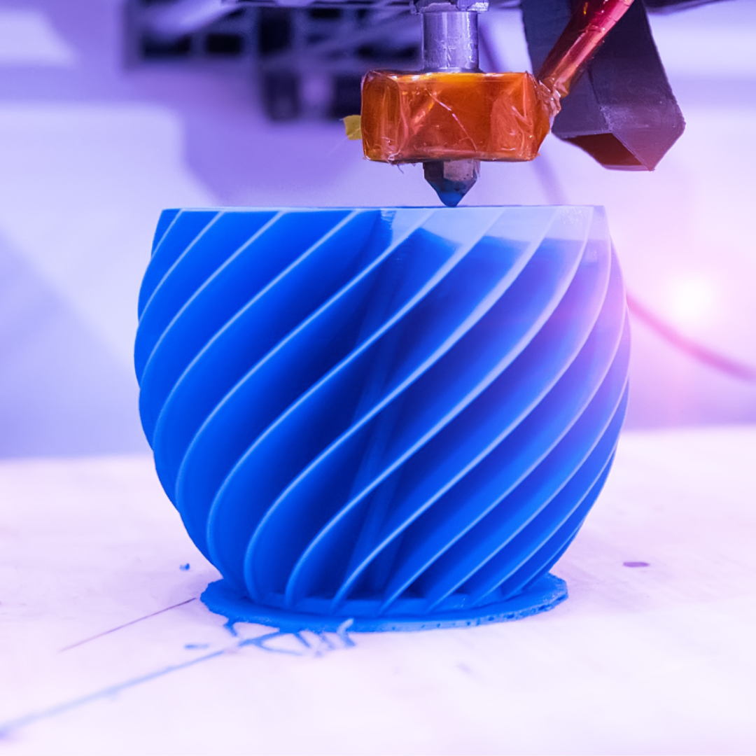 A green spool of pla filament.