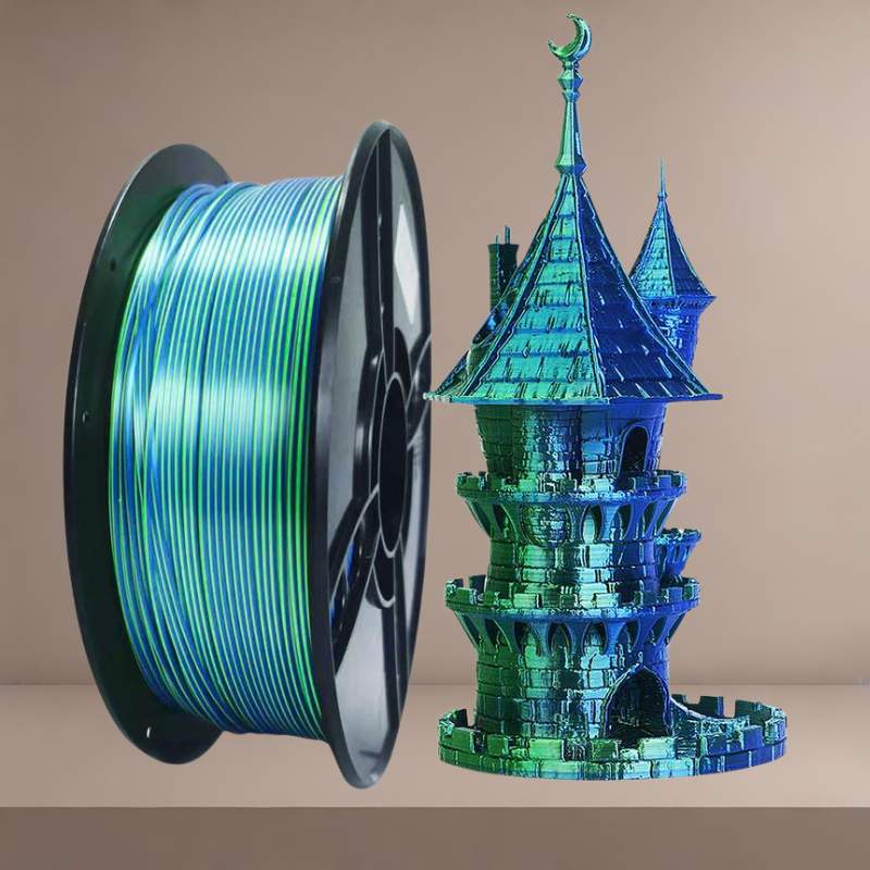 A green and blue 3d printing filament with a castle in the background.