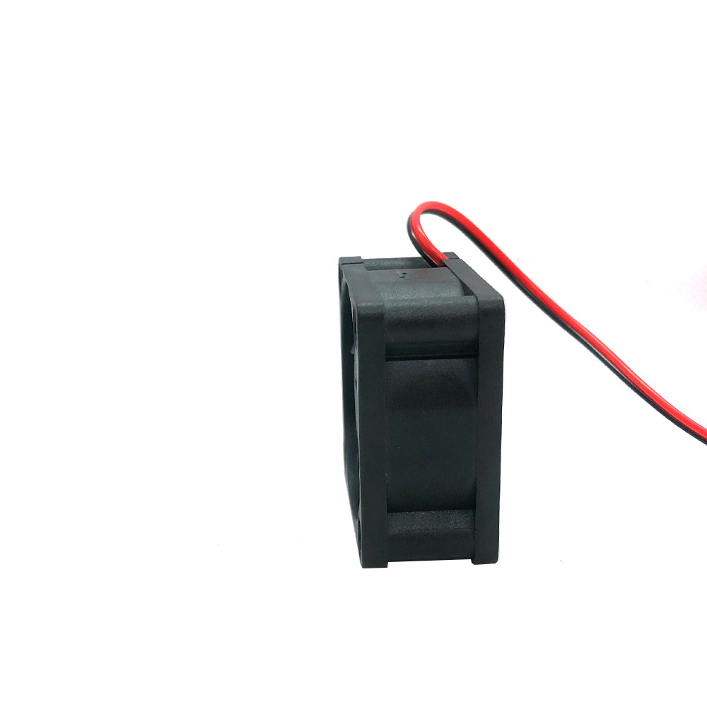 A small black 3D Printing Perth - Cirrus Link 4020 fan with dual ball bearings and 24V power, featuring red and black wires, is set against a white background.