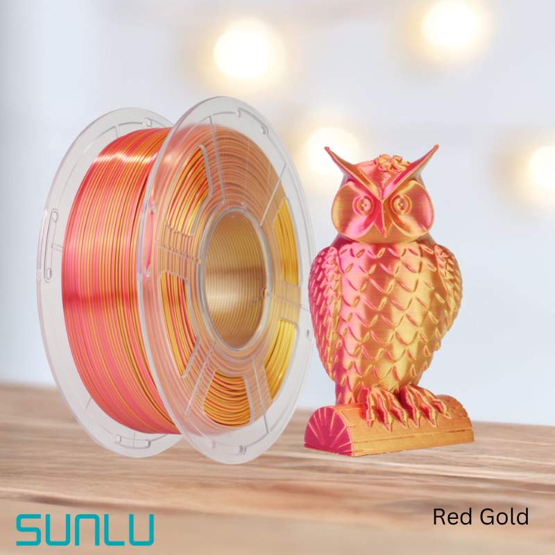 A spool of SUNLU PLA+ Silk Dual Colour 1.75mm 3D Printing Filament next to an owl figurine.