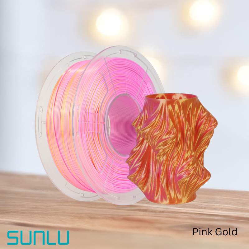A spool of eco-friendly Filament - SUNLU PLA+ Silk Dual Colour 1.75mm 3D Printing Filament by SUNLU on a table.