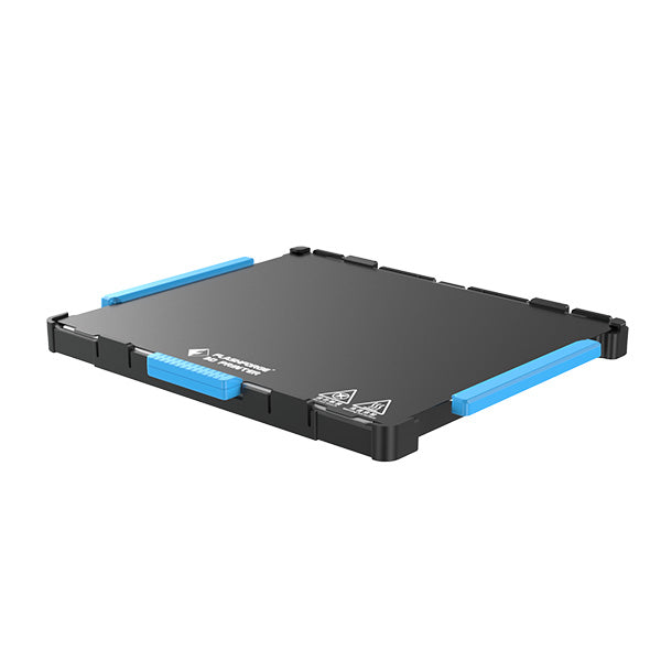 A rectangular Build Plate Kit for the Flashforge Adventurer 4 Series features a black and blue color scheme with a textured surface and logo, showcasing a high-performance design similar to innovations in 3D printing like the Flashforge Adventurer 4.