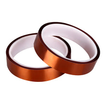 Two rolls of 3D Printing Perth - Cirrus Link 300°C High Temperature Tape (20mm x 20m, brown yellow) are stacked on a white background, ideal for 3D printer heating bed adhesion.