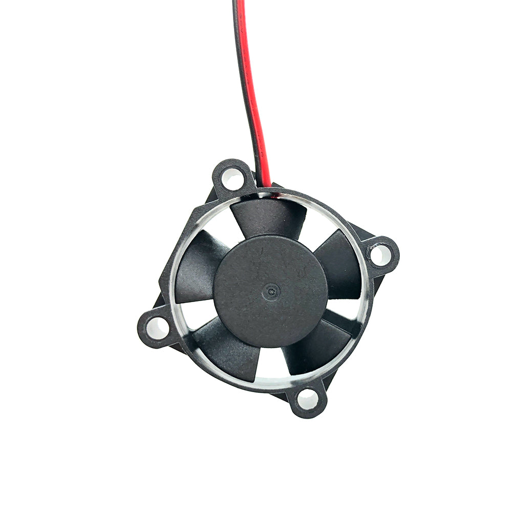 The 3010 12V Dual Ball Bearing Fan by 3D Printing Perth - Cirrus Link is a small black cooling fan designed with a circular shape mounted on a square frame. It features four blades and two wires—one red and one black—and uses dual ball bearings to deliver optimal airflow, making it perfect as a cooling fan for 3D printers. With dimensions of 30mm x 30mm x 10mm, this fan operates at 7880 RPM, providing an airflow of 3.5 CFM at a noise level of only 22 DBA.