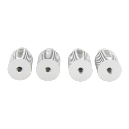 Four silver metal heat sink elements with fin-like ridges, designed for thermal management, are arranged in a row on a white background. Specifically suited for the E3D V5 Heat Sink Remote 1.75mm for Bowden Extruder by 3D Printing Perth - Cirrus Link, these components ensure efficient cooling and optimal performance.