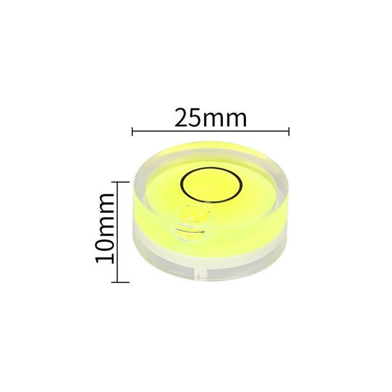 The Mini Spirit Level for Platform Calibration and Precision Leveling by 3D Printing Perth - Cirrus Link features a yellow liquid encased with a black center circle. This tool is perfect for 3D printer calibration, boasting dimensions of 25mm in diameter and 10mm in height to ensure enhanced print quality through precise leveling.