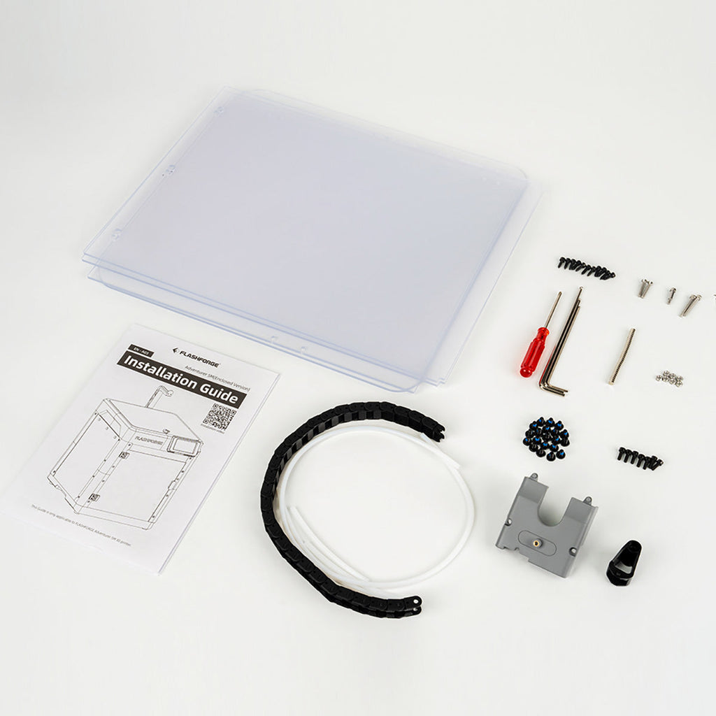 The Flashforge Adventurer 5M 3D Printer Enclosure kit comes with a plastic cover, instruction manual, screwdriver, hex keys, screws, cable, and mounting bracket. These essential components for setting up your printer enclosure are neatly organized on a white surface for easy identification and use.