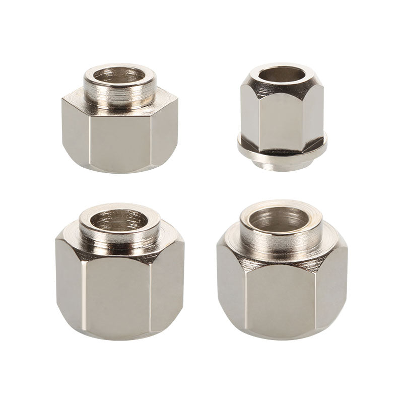 Four Eccentric Nut Nickel Plated V Groove Hex Nuts from 3D Printing Perth - Cirrus Link, ideal for mechanical applications, are displayed on a plain white background.