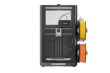 The FlashForge AD5X 3D printer with orange and yellow filament spools mounted on the right side achieves better temperature and safety control when paired with the FlashForge AD5X Printer Enclosure.