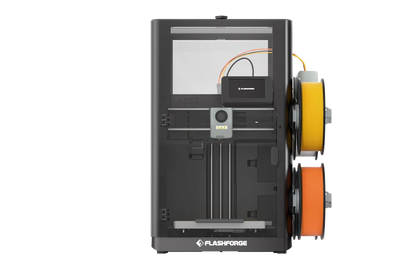The FlashForge AD5X 3D printer with orange and yellow filament spools mounted on the right side achieves better temperature and safety control when paired with the FlashForge AD5X Printer Enclosure.