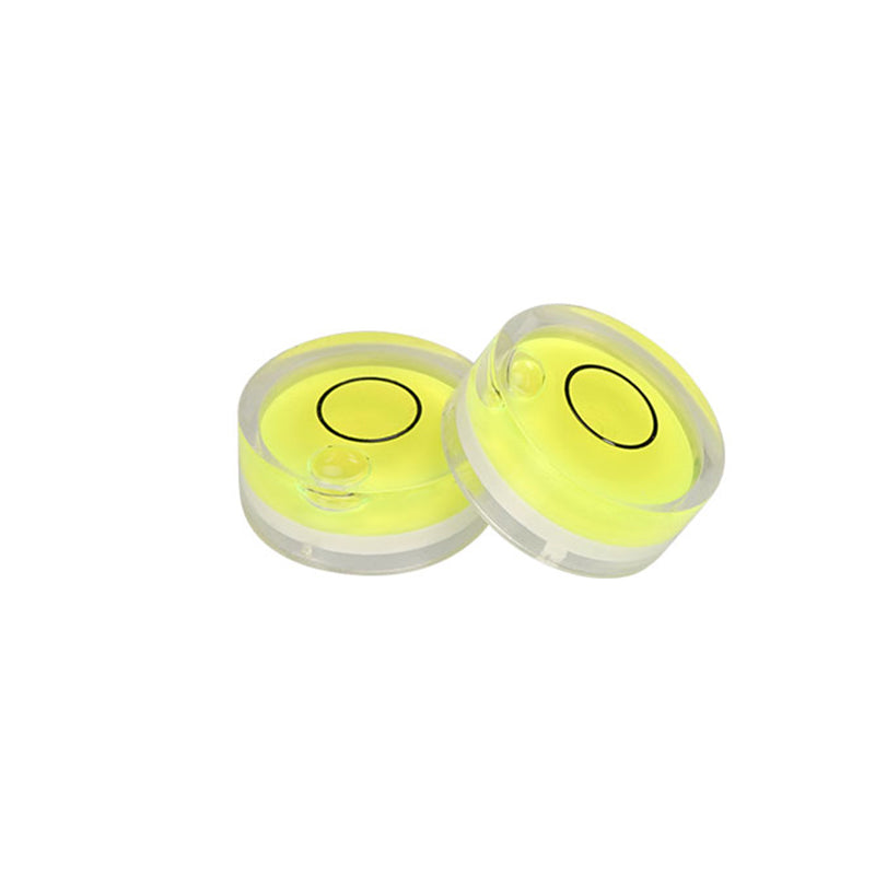 Two Mini Spirit Levels by 3D Printing Perth - Cirrus Link, featuring a round yellow design with black circles on a white background, ideal for platform calibration and precision leveling.