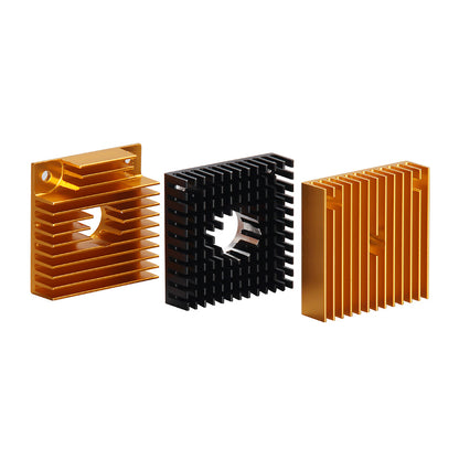 Three heatsinks—two gold, one black—with parallel fins and a central square cutout are shown upright in a row. These 40x40x11mm MK7 MK8 Heat Sinks by 3D Printing Perth - Cirrus Link suit 3D printer extruders.