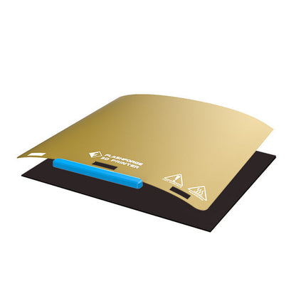 This versatile 3D printing plate from Flashforge, known as the PEI Sheet and Magnet Tape Assembly for Guider Ⅱ Series, is designed with a gold PEI sheet on top and enhanced by a blue tab on a sophisticated black base.
