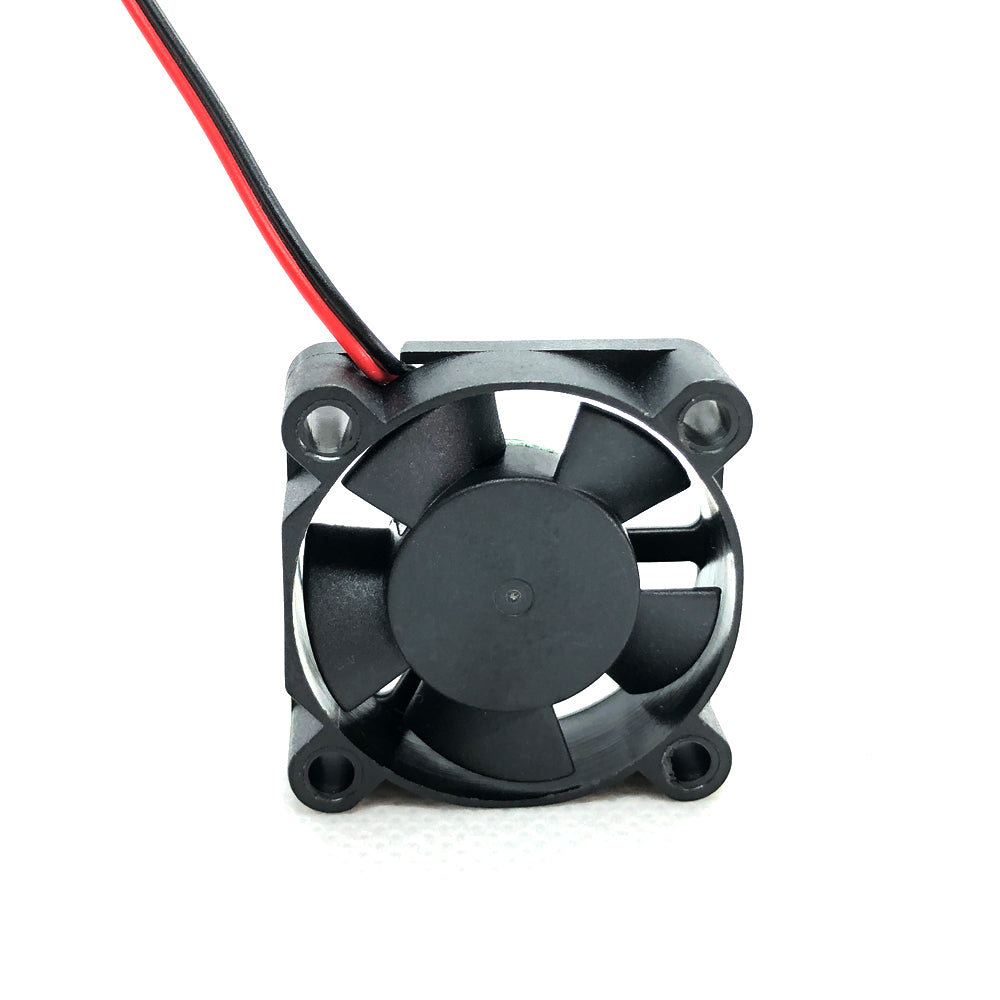 A compact 24V Dual Ball Bearing Cooling Fan by 3D Printing Perth - Cirrus Link features a circular blade housing and red and black wires attached, making it perfect for a 3D printer setup, set against a white background. This fan model is the 3010, with dimensions of 30mm x 30mm x 10mm.
