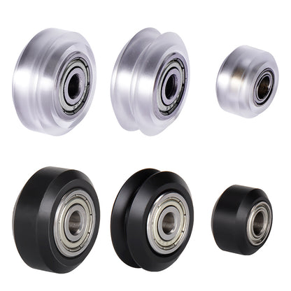 Six Pulley Wheel Small Wheel IN 5mm MR105 bearings from 3D Printing Perth - Cirrus Link, displayed against a white background: three metallic silver on top and three durable black plastic on the bottom.