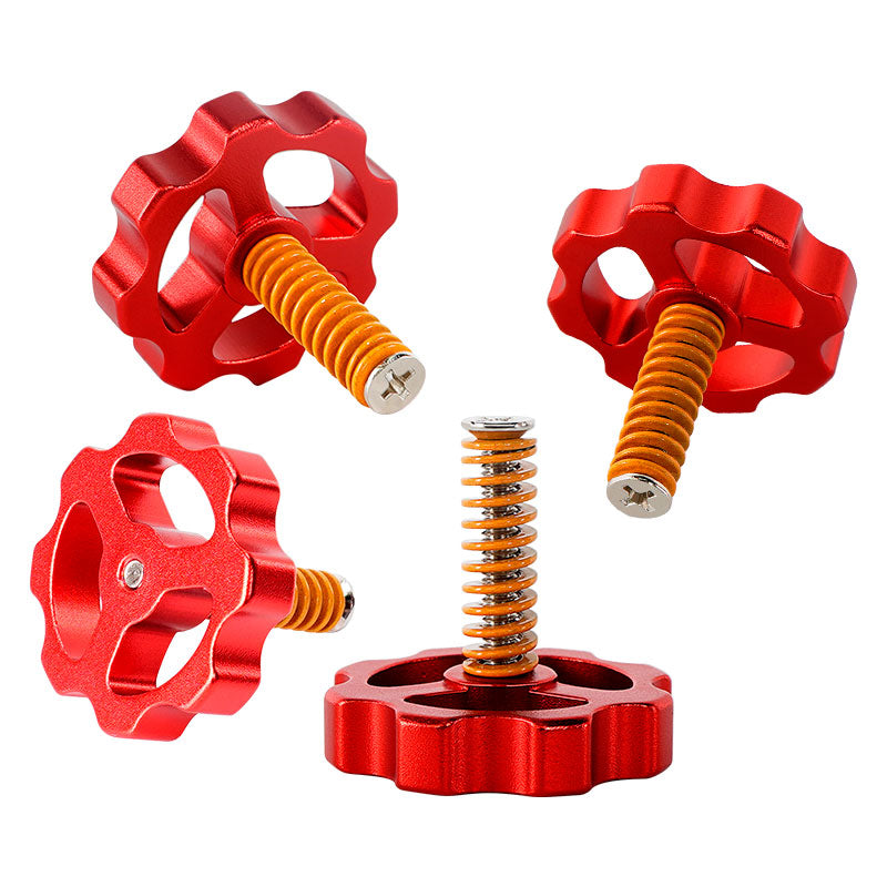 The CR10 M4 Leveling Spring & Nut Bed Platform Screw Kit by 3D Printing Perth - Cirrus Link features red star-shaped metal knobs with orange threaded screws and springs on a white background. These are essential for precision and stability in your 3D printing projects.