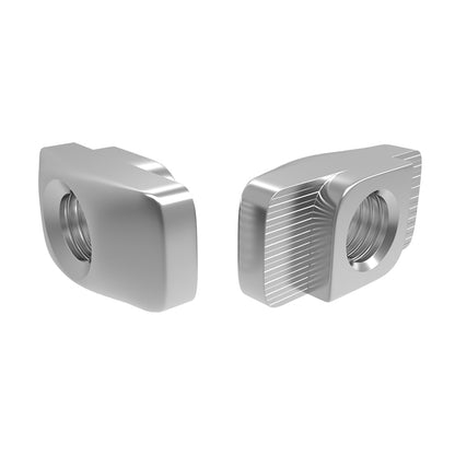 Two shiny, silver Aluminum Profile Nuts 2020 from 3D Printing Perth - Cirrus Link with threaded holes, each shaped irregularly, rest on a white background.