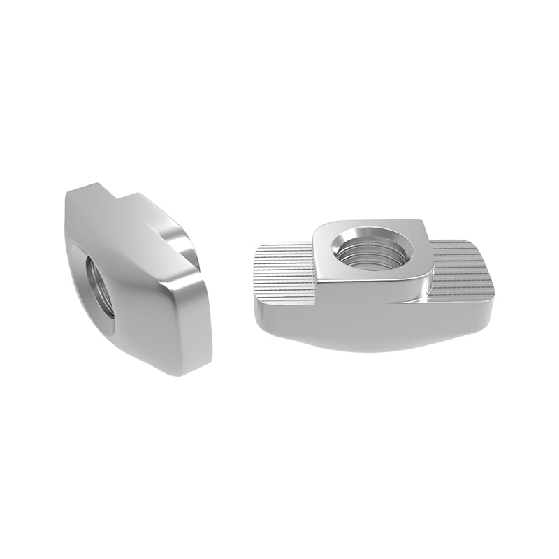 Two metal Aluminum Profile Nut 2020 Boat Hammer Nuts, one displayed from the side and the other from above, appear against a white background. These nuts, by 3D Printing Perth - Cirrus Link, are ideal for securing your projects involving a T-slot aluminum profile like the Aluminum Profile Nut 2020.