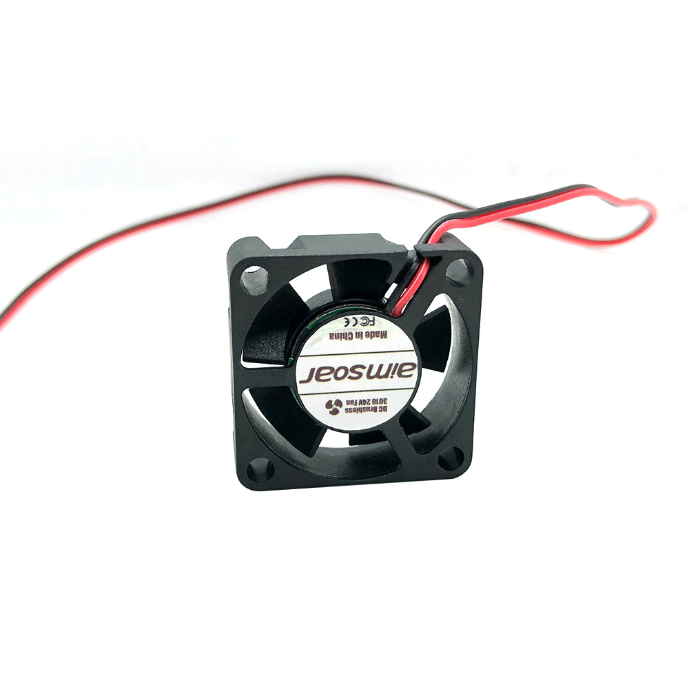 The 24V 3010 DC Fan by 3D Printing Perth - Cirrus Link, featuring red and black wires attached and a compact design of 30mm x 30mm x 10mm, ensures optimal cooling for 3D printers with low noise at 27.7 DBA and an airflow of 4.2 CFM thanks to its hydraulic bearing.