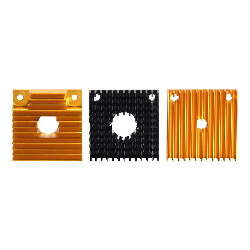 Three square MK7 MK8 Heat Sink 40x40x11mm units—two gold, one black—each with a central hole and finned design from 3D Printing Perth - Cirrus Link are displayed side by side. Perfect for upgrading your 3D printer extruder.