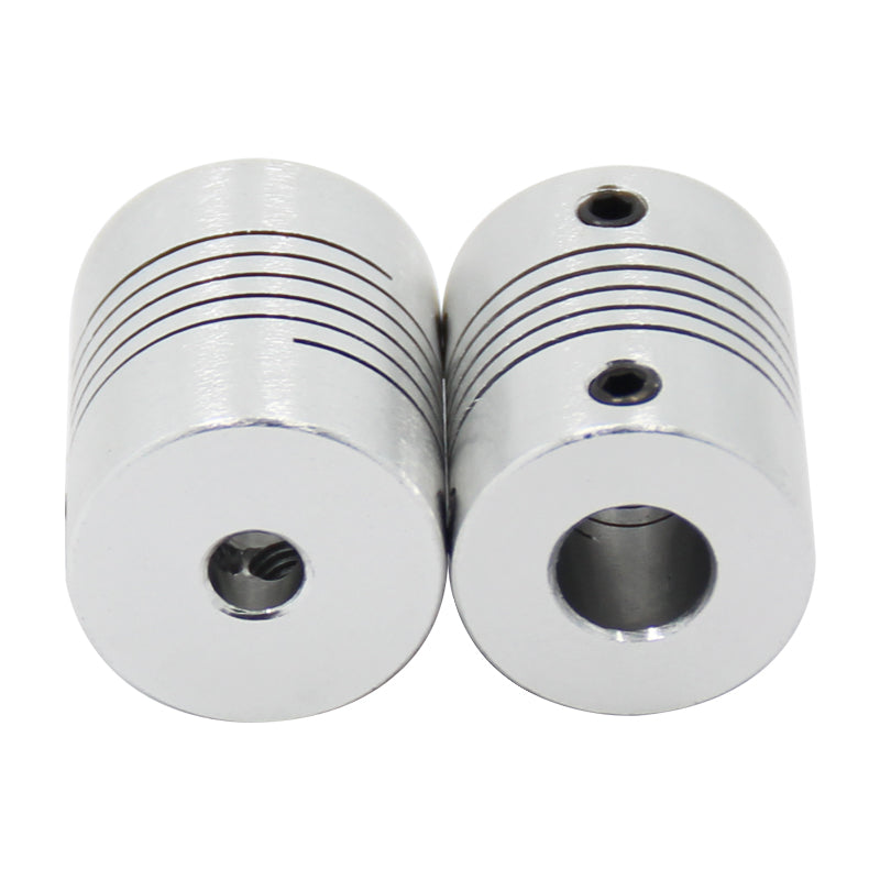 Two ASR Anti-Vibration Flexible Couplings for Lead Screw Motion, featuring helical cuts and set screw holes, ideal for 3D printer Z-axis use, are shown side by side on a white background.