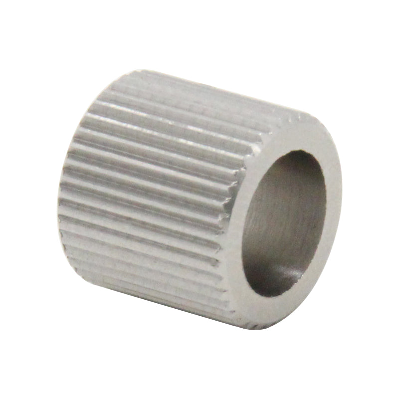 Viewed from an angle against a white background is the 3D Printing Perth - Cirrus Link's 40 Tooth Stainless Steel Feed Wheel, featuring a cylindrical shape with precision ribbed surface, measuring 12mm in diameter and 11mm in height.