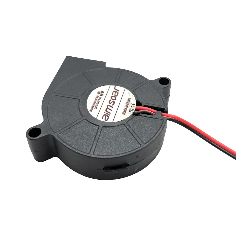 A compact black plastic Blower 5015 model from 3D Printing Perth - Cirrus Link, equipped with red and black wires for 3D printing cooling. This durable fan operates at 24V and features a dual ball bearing system.