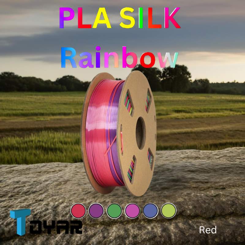 A spool of Toyar PLA Silk Rainbow filament in a field.
