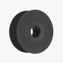The Bambu Lab Bambu Reusable Spool for Refillable Filament is a black, perforated cylindrical spool with a large central hole, perfect for filament storage, shown against a plain white background.