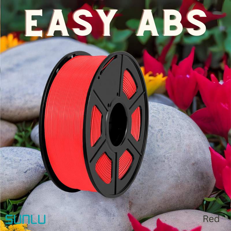 A spool of SUNLU Easy ABS 1.75mm 3D printing filament is set on smooth gray stones, with vivid red and yellow flowers in the background.