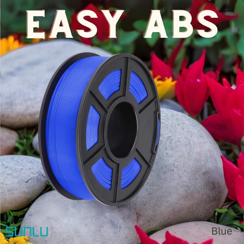 A spool of SUNLU Easy ABS 1.75mm 3D printing filament is shown outdoors on rocks, with red flowers in the background.