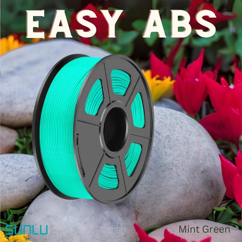 A spool of SUNLU Easy ABS 1.75mm 3D Printing Filament is shown on smooth stones, with colorful flowers in the background.