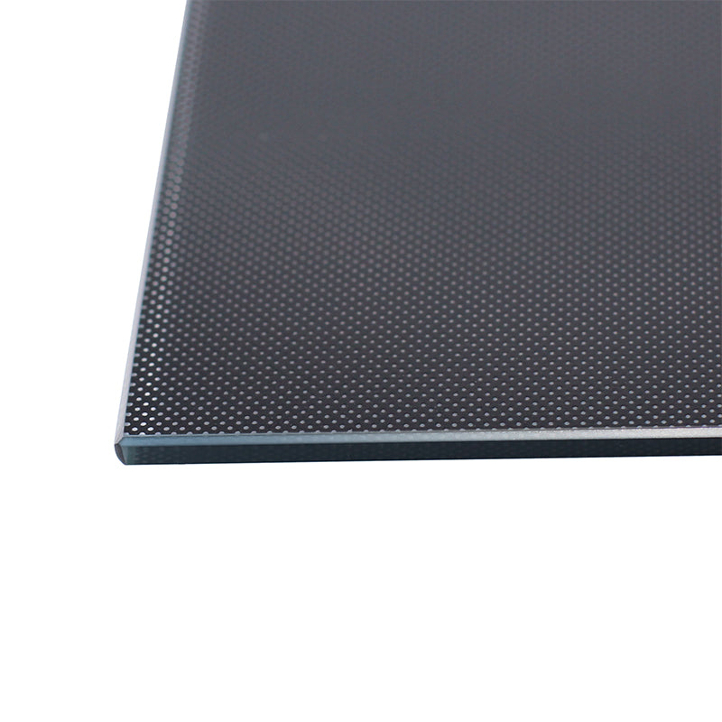 Close-up of the corner of the Lattice Platform Glass Platform from 3D Printing Perth - Cirrus Link, featuring a 4mm thickness with a matte finish and a fine dot pattern resembling a lattice.