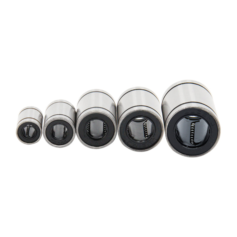 Five 3D Printing Perth - Cirrus Link Linear Ball Bearings of varying sizes are lined up, ideal for precision CNC machining projects.
