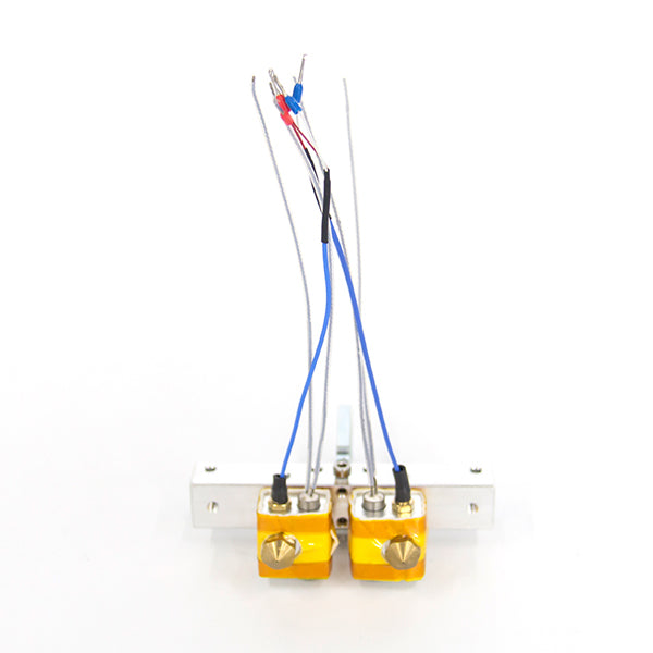 The Extruder Assembly for the Flashforge Dreamer 3D Printer, by Flashforge, includes dual heating blocks with wiring and temperature sensors mounted on a sturdy metal bracket for precise 3D printing.