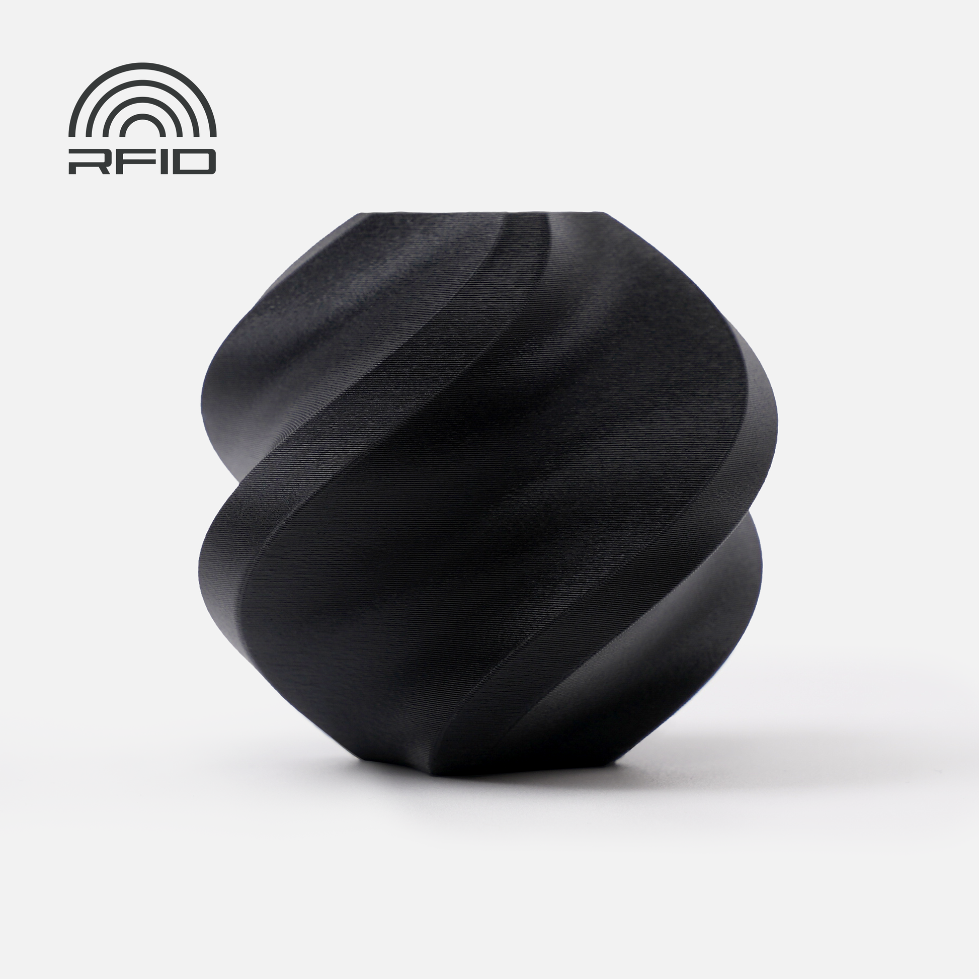 A matte black, spiral-shaped object 3D printed with 1.75mm BambuLab Filament Matte from 3D Printing Perth - Cirrus Link is shown on a white background, featuring a smooth surface and an RFID logo in the top left corner.