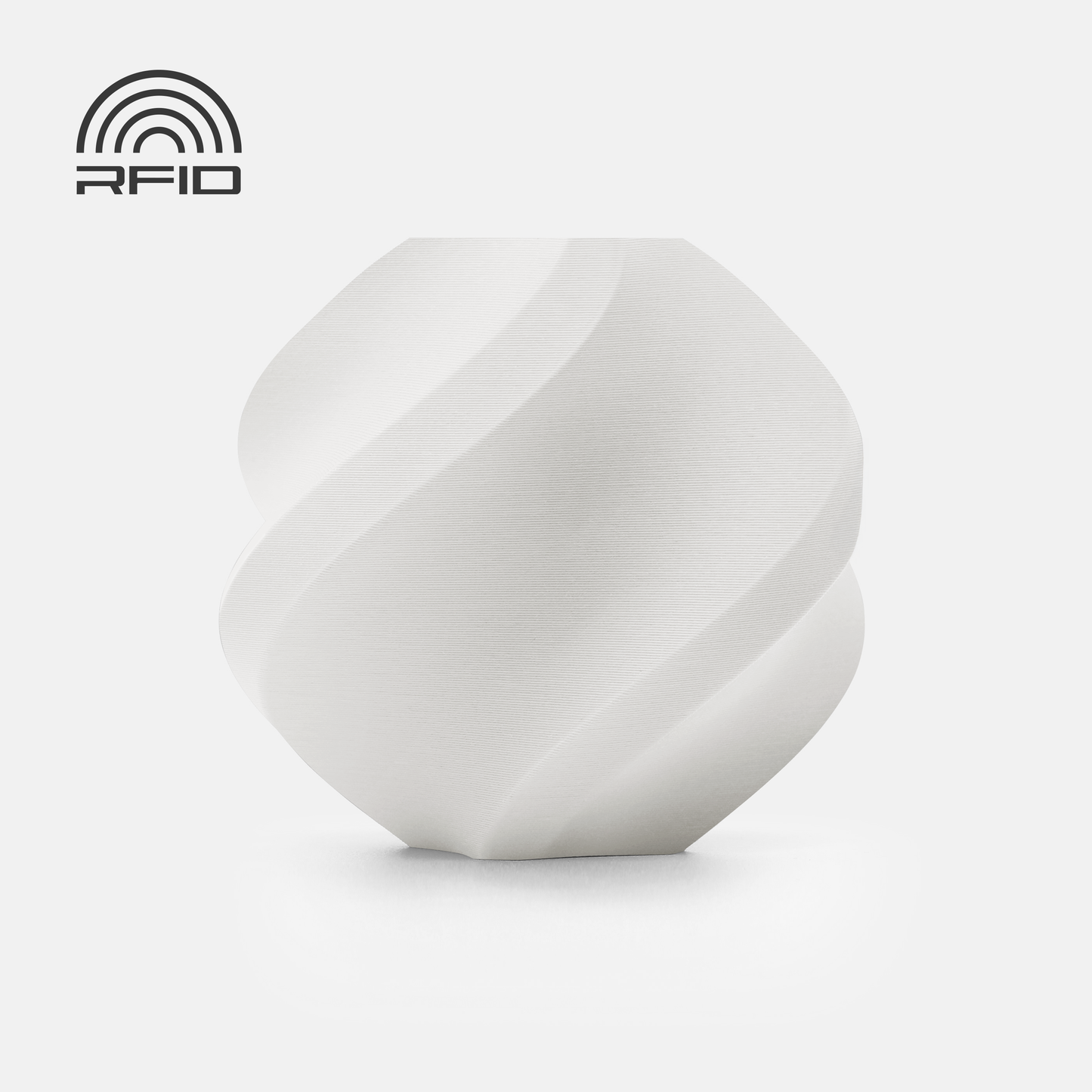 The BambuLab Filament Matte by 3D Printing Perth - Cirrus Link, a white, geometrically twisted object with a biodegradable matte finish, sits on a plain background with an RFID symbol in the upper left corner.