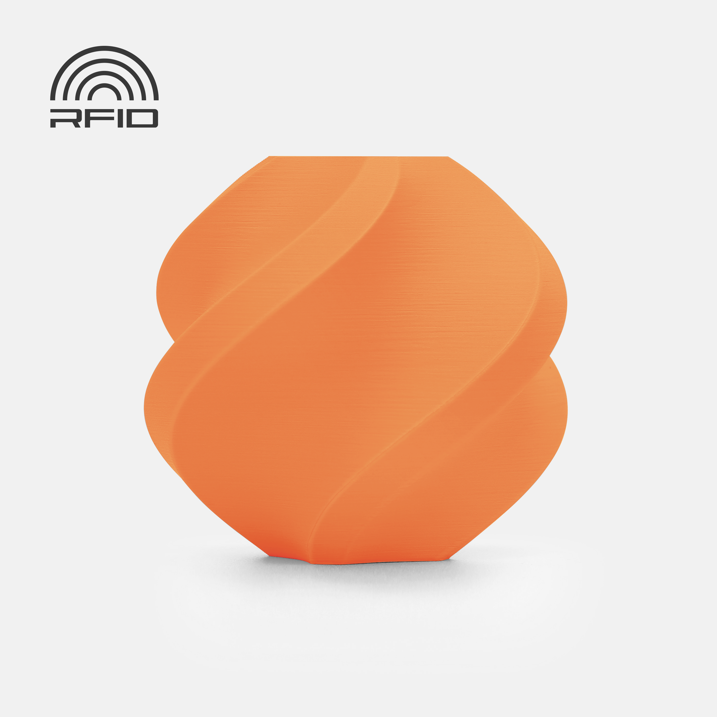 An orange, geometric vase with spiral grooves and a matte surface, 3D printed using 1.75mm BambuLab Filament Matte from 3D Printing Perth - Cirrus Link, sits on a white background. RFID symbol is visible in the top left corner.