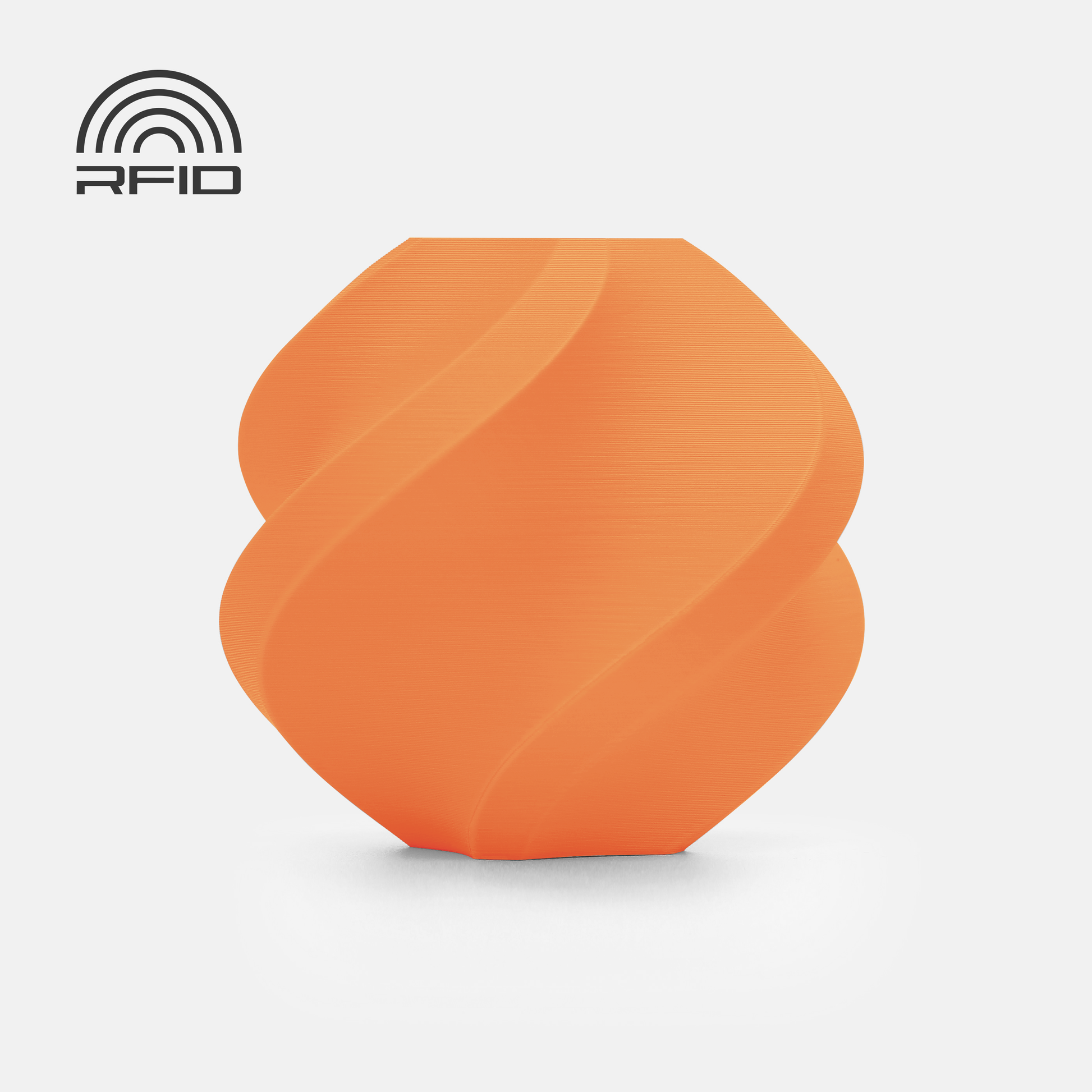 An orange, geometric vase with spiral grooves and a matte surface, 3D printed using 1.75mm BambuLab Filament Matte from 3D Printing Perth - Cirrus Link, sits on a white background. RFID symbol is visible in the top left corner.