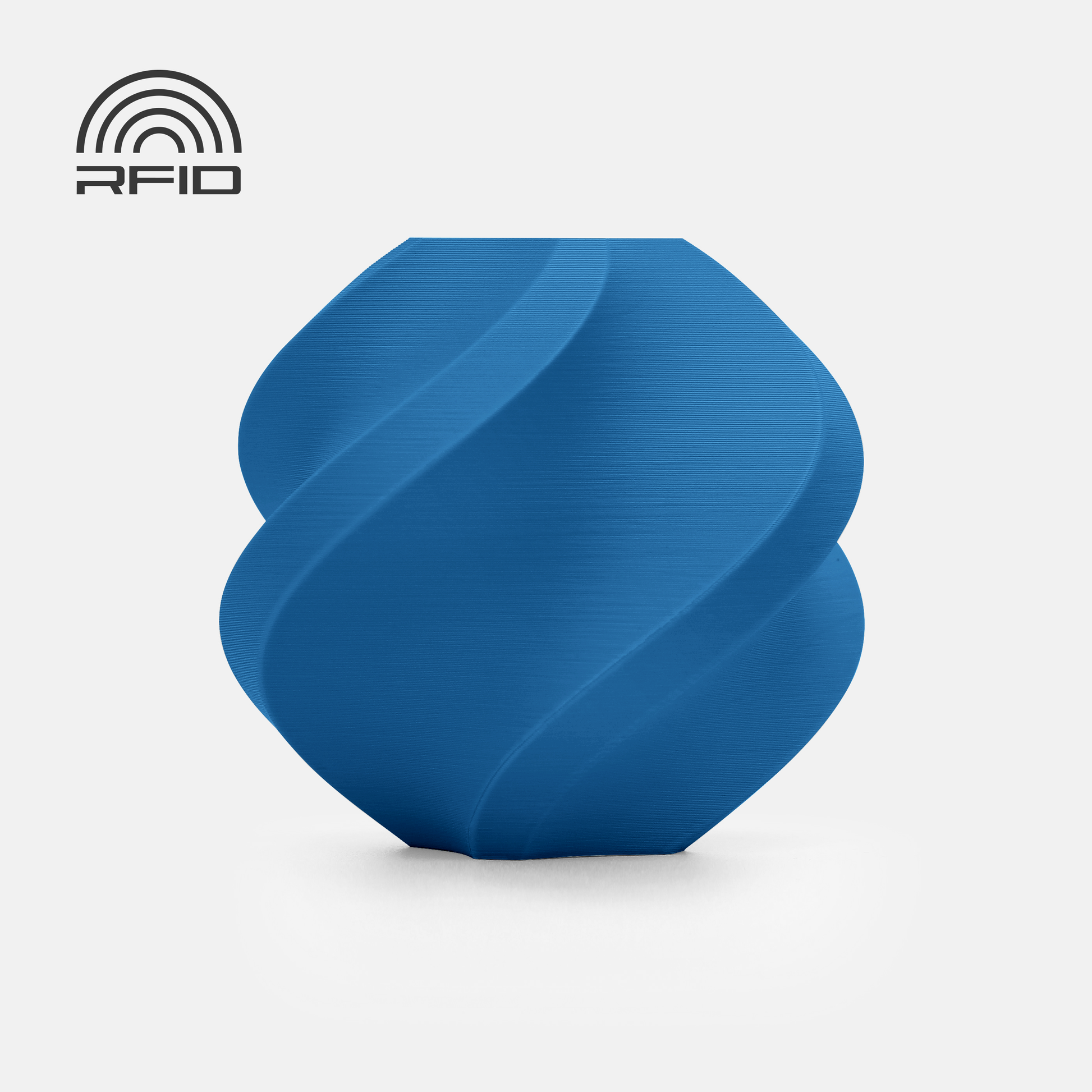 A blue, geometric BambuLab Filament Matte by 3D Printing Perth - Cirrus Link with spiral grooves and a matte finish is shown on a white background. An RFID symbol appears in the top left corner.